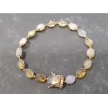 GOLD 9CT OPAL AND YELLOW STONE BRACELET 13G GROSS