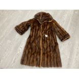 A VINTAGE LADIES 3/4 LENTH FUR COAT SIZE SMALL MEDIUM