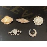 FIVE VICTORIAN SILVER BROOCHES OF VARIOUS DESIGNS 24.3G GROSS