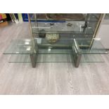 A CONTEMPORARY GLASS AND METAL TWO TIER COFFEE TABLE 160 X 32 X 42CM