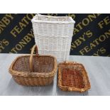 A WICKER LAUNDRY BASKET PLUS 2 OTHER WICKERS BASKETS