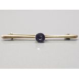 9CT YELLOW GOLD BROOCH WITH CENTRAL SET FACETED AMETHYST 1.3G