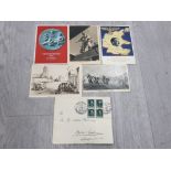 THIRD REICH WARTIME PROPAGANDA CARDS AND AN ENVELOPE WITH HITLER STAMPS USED AT NUREMBERG IN 1937