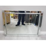 A MODERN BEVELLED GLASS WALL MIRROR WITH BEVELLED GLASS FRAME 74 X 104CM
