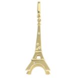 A Eiffel Tower charm, with diamond highlights, by Louis Vuitton.