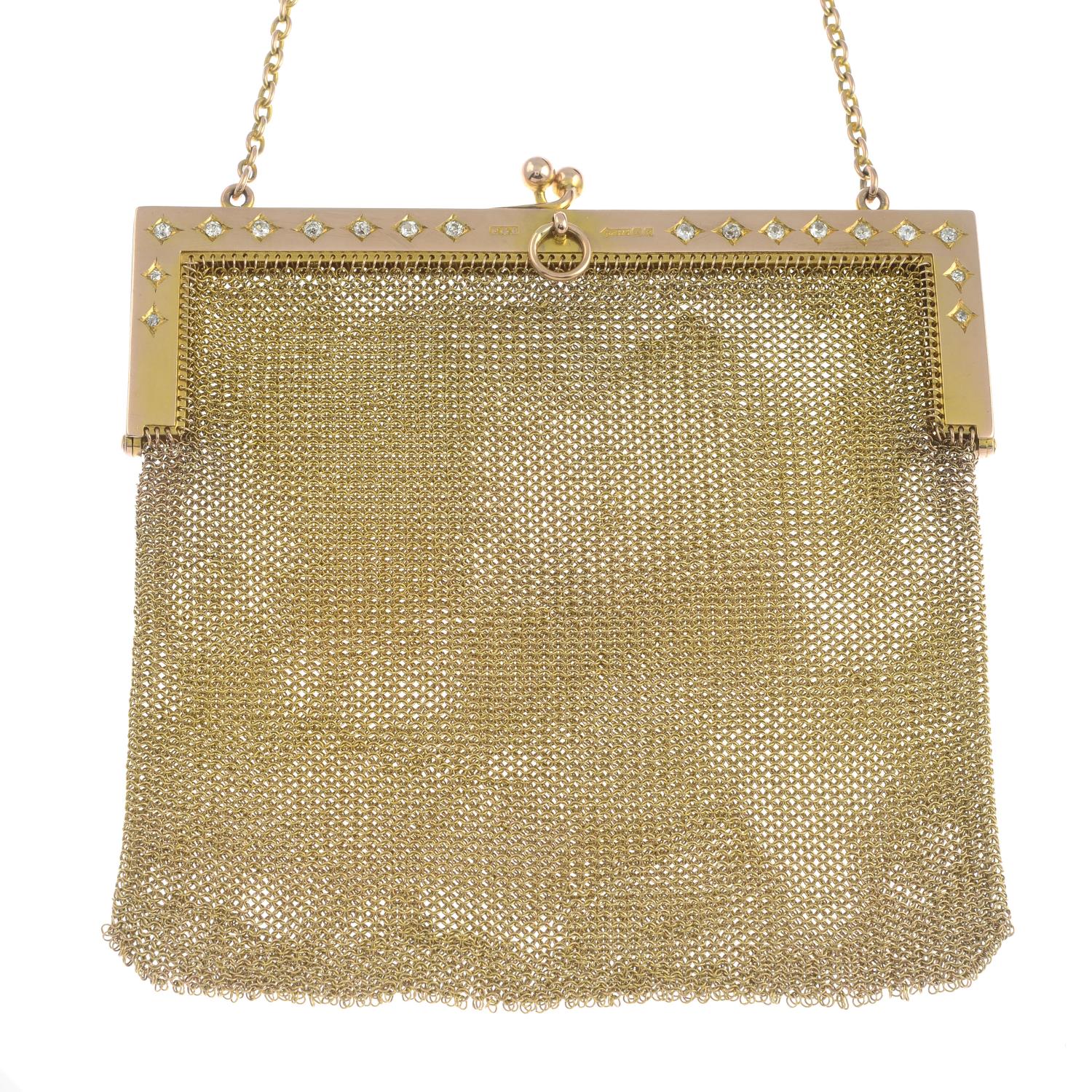 An Edwardian 9ct gold mesh-link purse, with old-cut diamond highlights.