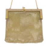 An Edwardian 9ct gold mesh-link purse, with old-cut diamond highlights.