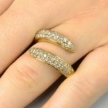 A pave-set diamond scroll ring by Chaumet.Estimated total diamond weight 1.65cts,