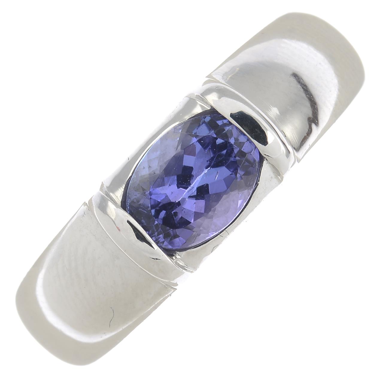 A tanzanite single-stone band ring, by Chaumet. - Image 6 of 6