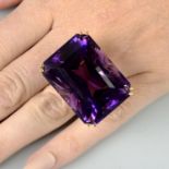 A large amethyst single-stone dress ring.