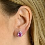 A pair of pink sapphire and diamond cluster earrings.