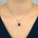 A tanzanite and diamond pendant, on chain.