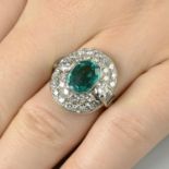 A Colombian emerald and diamond cluster ring.With report 78153-96,