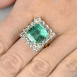 An 18ct gold Colombian emerald and brilliant-cut diamond scalloped cluster ring.With report