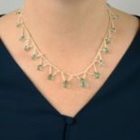 An early 20th century green beryl and seed pearl fringe necklace.