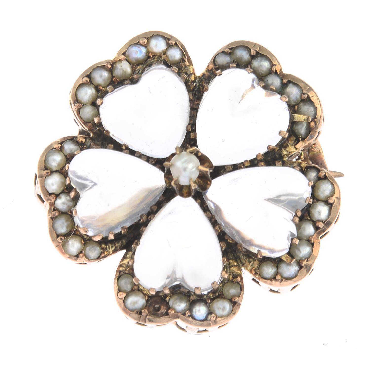 An Edwardian gold moonstone and split pearl floral brooch.Diameter 2cms. - Image 5 of 5