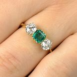 An early 20th century 18ct gold emerald and diamond three-stone ring.