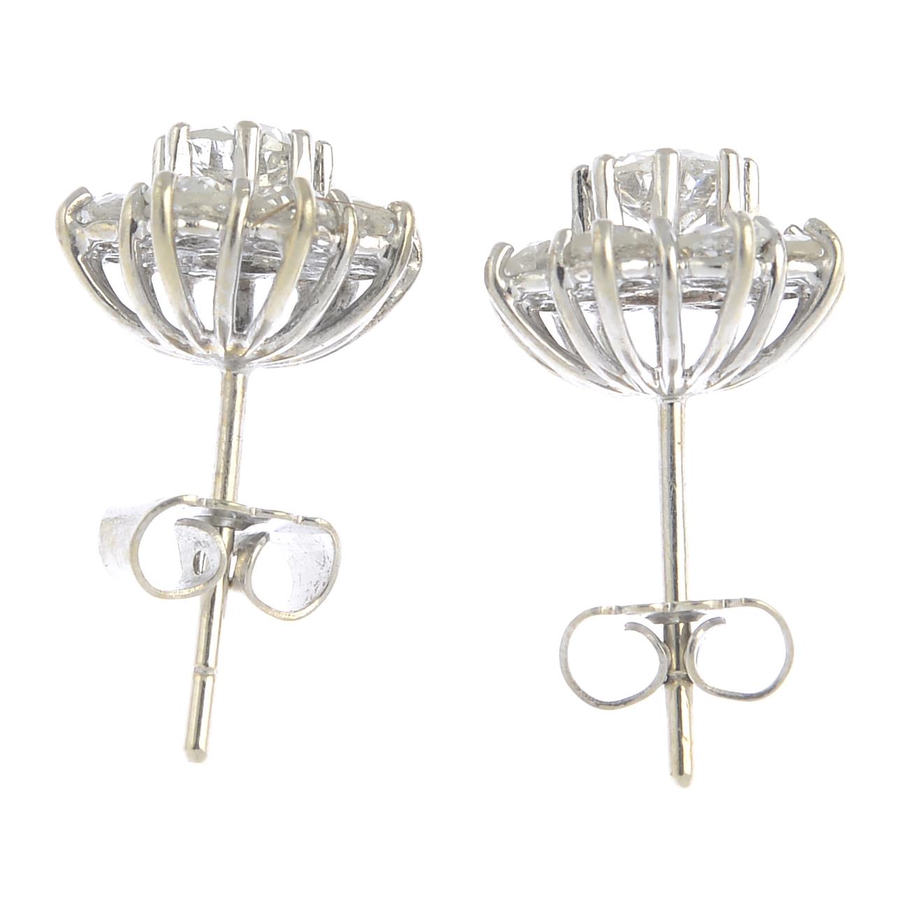 A pair of old-cut diamond floral cluster stud earrings.Estimated total diamond weight 1ct, - Image 2 of 3