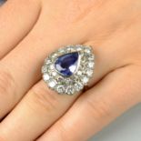 A 14ct gold sapphire and diamond cluster ring.