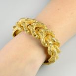 A mid 19th century gold floral embossed bracelet.Length 17.5cms.