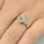 A platinum marquise and pear-shape diamond three-stone ring.With report 08000015003,