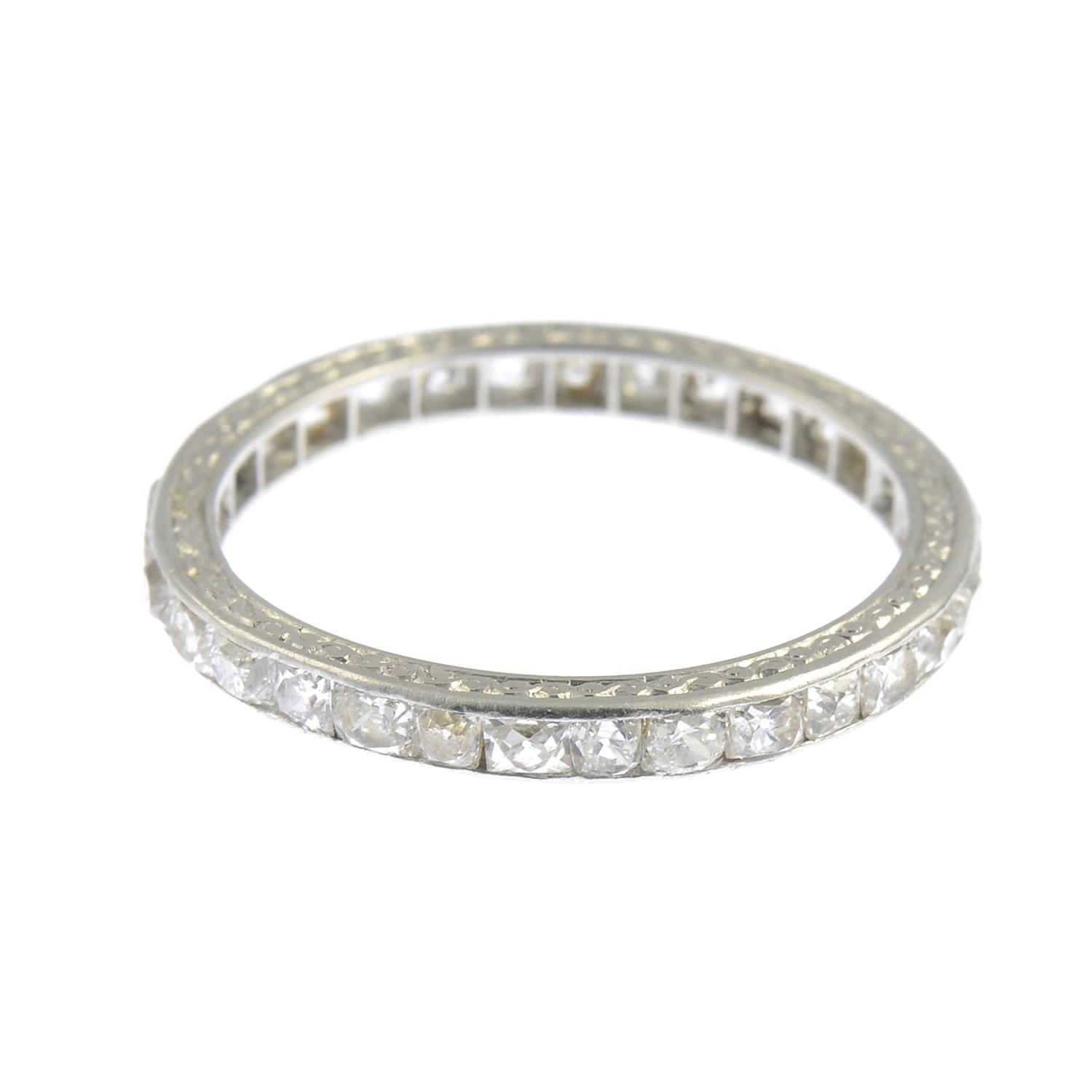 An early 20th century platinum square-shape old-cut diamond full eternity ring, - Image 4 of 5