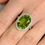 A peridot and diamond cluster ring.