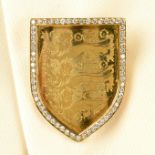 An 18ct gold diamond Football Association shield brooch.