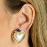 A pair of mabe pearl, sapphire and diamond heart earrings.