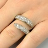 A pave-set diamond scroll ring by Chaumet.Estimated total diamond weight 1.65cts,