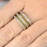 A diamond and 'yellow' diamond stepped bands dress ring.Estimated total diamond weight 1.25cts,