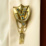 A late Victorian gold foil-back gem and split pearl shield brooch,