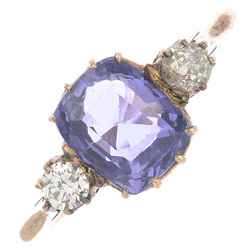 A Sri Lankan sapphire and diamond three-stone ring. - Image 6 of 6