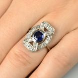 A mid 20th century platinum sapphire and diamond dress ring.