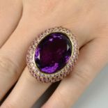 An amethyst and graduated pink sapphire dress ring.Amethyst calculated weight 28.41cts,