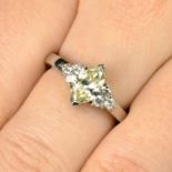 A platinum marquise-shape 'yellow' diamond ring,