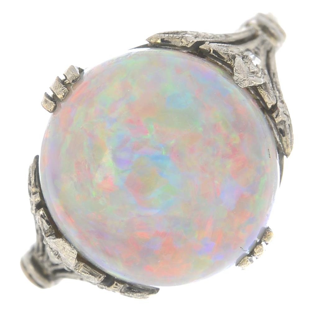 A black opal and rose-cut diamond accent ring.Opal weight 4.61cts.Ring size M. - Image 6 of 6