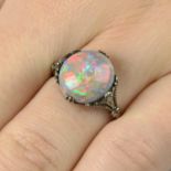 A black opal and rose-cut diamond accent ring.Opal weight 4.61cts.Ring size M.