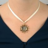 An Edwardian 12ct gold rock crystal and agate pendant, with central rose-cut diamond letter 'F'.