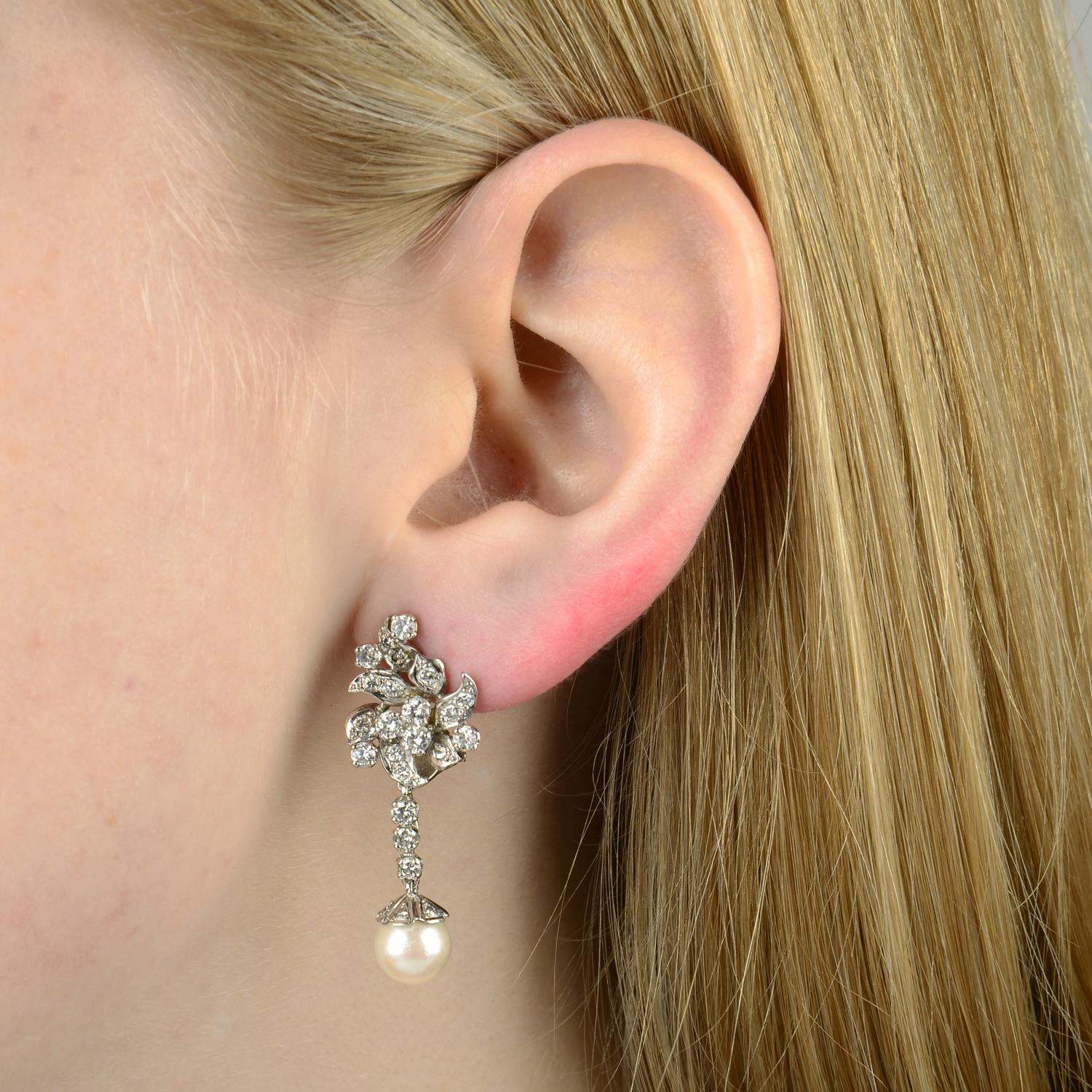 A pair of mid 20th century brilliant-cut diamond floral cluster earrings,