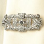 A mid 20th century vari-cut diamond platinum brooch.Principal diamond estimated weight 0.85ct,