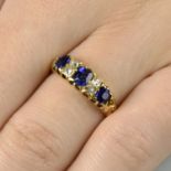 A late Victorian 18ct gold sapphire three-stone and diamond spacer ring.Hallmarks for Birmingham,