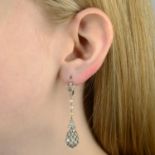 A pair of early 20th century platinum and old-cut diamond and seed pearl pierced drop