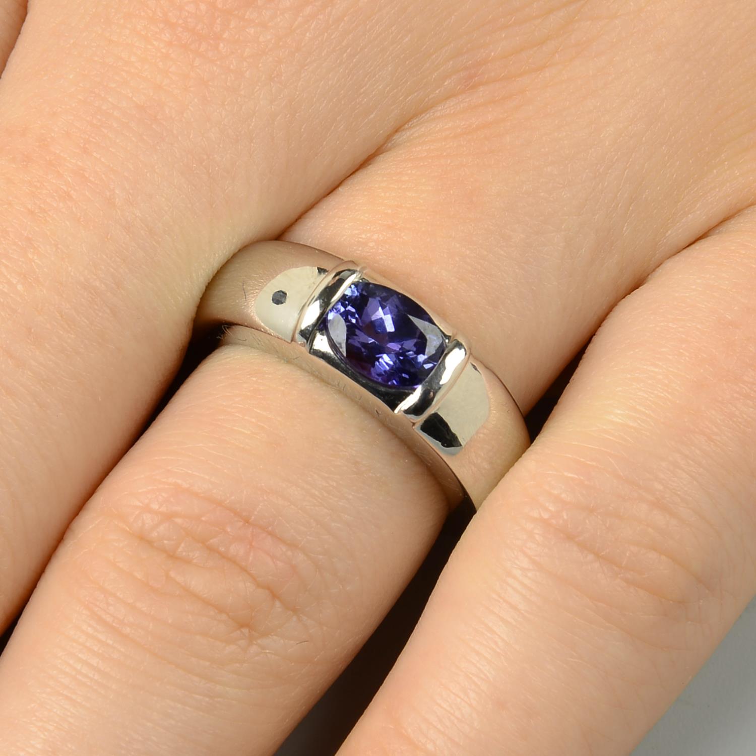 A tanzanite single-stone band ring, by Chaumet.