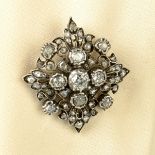 A mid Victorian silver and gold old and rose-cut diamond brooch.