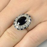 A sapphire and diamond cluster ring.Principal sapphire weight 3.77cts.Estimated total diamond