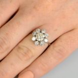 A brilliant-cut diamond floral cluster ring.