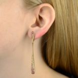 A pair of pink sapphire and diamond drop earrings, by Stephen Hafner.