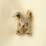 An 18ct gold pink sapphire, diamond and onyx bunny brooch, by David Morris.