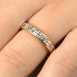 An 18ct gold calibre-cut diamond full eternity ring.